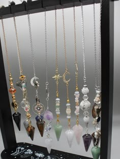 The power of personalized energy with our exquisite Custom Crystal Pendulum. Crafted with precision and intention, each pendulum is a unique masterpiece tailored to your desires. Whether you seek clarity, guidance, or alignment, this bespoke tool is designed to resonate with your energy and amplify your intentions. Our skilled artisans hand-select each crystal, ensuring the highest quality and vibrational resonance. From soothing Amethyst to empowering Tiger Eye, our wide selection of crystals allows you to choose the perfect stone that aligns with your intentions and energy. Personalize your pendulum further with Pendant or design, making it a truly one-of-a-kind treasure. Our customization options add a touch of personal magic to your pendulum. Harness the ancient wisdom of divination an Spiritual Crystal Necklace With Adjustable Chain And Dangle, Dowsing Pendulum, Pendulum Dowsing, Crystal Pendulum, Crystal Angels, Herbal Magic, Witch Jewelry, Handmade Wire Jewelry, Ancient Wisdom