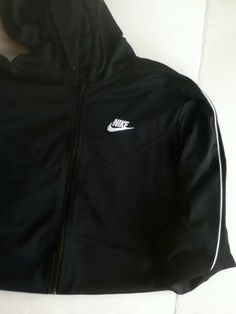 AUTHENTIC NIKE WOMEN  SPORTSWEAR HERITAGE TRACK SUIT DB3880-010 DB3886-010 STANDARD FIT  BODY 100% POLYESTER  RIB 97% COTTON 3%SPANDEX HOOD  LINING 100% POLYESTER Nike Sportswear Tracksuit For Sports, Winter Athleisure Tracksuit For Jogging, Nike Athleisure Tracksuit For Winter, Nike Winter Athleisure Tracksuit, Athleisure Track Jacket With Three Stripes For Training, Nike Sports Tracksuit, Nike Hooded Activewear For Jogging, Nike Athleisure Track Jacket, Nike Sporty Hooded Tracksuit