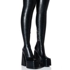 Make Your Move In The Azalea Wang " The Ultimate Strut Stretch "This Way Thigh High Platform Boot In Black. This Thigh High Boot Features An Ultra-Chunky Heel, A Platform Base, A Slightly Squared Toe, A Faux Leather Upper, And A Tonal Inner Ankle Zipper Closure. - Faux Leather Upper - Slightly Squared Toe - Chunky Heel - 25” Shaft Height - 14" Calf Circumference (With Additional Stretch From Material) - 5.5” Heel Height - 2” Platform Height Leather Boots Reference, Fitted High Cut Platform Boots, Thigh High Platform Heeled Boots For Night Out, Fitted Knee-high Platform Heeled Boots, Fitted Platform Heeled Boots For Club, Leather Over The Knee Platform Boots For Club, Leather Over-the-knee Platform Boots For Club, Thigh High Platform Boots For Night Out, Knee High Platform Boots Outfit