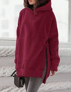 This hoodie from Split is perfect for any woman who wants to look stylish and feel comfortable while working out or during any casual activity. The hoodie has a red color with a split hem design and raglan sleeves. It is made of 100% polyester material and has a regular fit, which is suitable for size M. The hoodie is a pullover type with no zippers or buttons and is perfect for activewear occasions. It has a hood and is designed with a focus on comfort and style. The hoodie is brand new with ta Red Sweatshirt For Loungewear In Fall, Red Sweatshirt For Fall Loungewear, Red Fall Sweatshirt For Loungewear, Red Hooded Sporty Sweater, Red Hoodie With Ribbed Cuffs For Loungewear, Red Fleece Long-sleeve Hoodie, Cozy Red Sweatshirt With Ribbed Cuffs, Red Winter Sweatshirt With Kangaroo Pocket, Red Fleece Hoodie For Loungewear