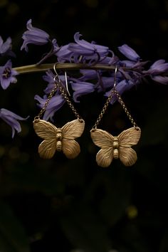 A beautiful symbol of metamorphosis and transformation. These wonderfully detailed butterfly earrings (or moth if you prefer) have a realistic look in an antique style. Crafted from solid raw (not plated) brass with solid raw brass chain and solid sterling silver ear hooks. These earrings are a good size, but very light weight. I added a patina to enhance the antique feel and highlight the texture. Be sure to check out my butterfly pin to match! length: 2 1/2 inches long including the ear wire w Bohemian Butterfly Earrings For Pierced Ears, Bohemian Butterfly Jewelry For Wedding, Bohemian Butterfly Wedding Jewelry, Butterfly Earrings For Jewelry Making, Bohemian Butterfly Nickel-free Jewelry, Unique Nickel-free Butterfly Earrings, Bohemian Butterfly Jewelry With Pierced Design, Unique Butterfly-shaped Jewelry With Matching Earrings, Unique Butterfly Earrings For Jewelry Making