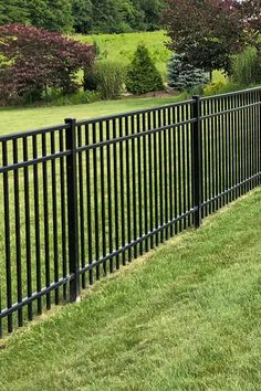 Aluminum Fence Black Fence Ideas Front Yards, Black Rod Iron Fence, Black Fence Around Pool, Black Aluminum Fence Front Yard, Black Metal Fencing, Black Metal Fence Ideas, Modern Fencing Ideas, Pool Fences And Gates, Iron Fence Privacy Ideas