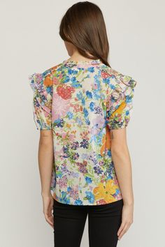 This top has a floral pattern that you will love! Its simple & comfy fit make it so easy to style for work or play! This top features a V-neckline with a self tie closure at the neck, short sleeves with elastic, smocking on the shoulders, ruffle detailing on the shoulders, neck & sleeves, has a soft & silky fabric and an a-line silhouette. We like it paired with a denim jacket for a casual look or a leather jacket for an edgier vibe. Small Bust 38" Length 25" : Medium Bust 40" Length 25" Large B Floral Print Rayon V-neck Top, Casual Floral Print Short Sleeve Top For Summer, Summer Rayon Blouse With Floral Print, Spring Floral Print Flutter Sleeve Blouse, Spring Floral Print Tops With Flutter Sleeve, Feminine Floral Print Blouse With Flutter Sleeves, Feminine Short Sleeve Tops With Ditsy Floral Print, Printed Short Sleeve Tops For Brunch, Spring Floral Print Rayon Blouse