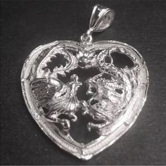 New Large Handcrafted 925 Silver Chinese Double Happiness For Wedding Dragon & Phoenix Heart Charm Pendant Metal : .925 Solid Silver Pendant Type : Dragon & Phoenix Heart Pendant Approximate Width : 1 . 2 7 “ Inches (3 2 . 3 Mm) Approximate Height : 1 . 3 3 “ Inches (3 3 . 8 Mm) Approximate Thickness : 0 . 0 6 “ Inches (1 . 7 Mm) Approximate Total Weight: 7 . 5 To 8 . 5 Grams Finish : Polish / Glossy Item # : Jn12101808-S-5098 Traditional Heart-shaped Jewelry For Weddings, Traditional Heart Jewelry For Wedding, Traditional Heart-shaped Wedding Jewelry, Engraved Heart Cut Jewelry For Wedding, Sterling Silver Heart Pendant For Wedding, Sterling Silver Jewelry For Wedding On Valentine's Day, Sterling Silver Wedding Jewelry For Valentine's Day, Heart-shaped Engraved Wedding Jewelry, Engraved Double Heart Wedding Jewelry