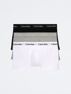 A Calvin Klein icon. The essential designer trunk reinvented in extra-soft cotton stretch with a low rise fit. Made with wicking to keep you cool and dry. With a supportive pouch and more coverage than our hip brief, this style is easy under anything.  Material: 95% Cotton, 5% Elastane. Calvin Klein Fitted White Boxer Briefs, Calvin Klein Cotton Boxer Briefs For Sports, Calvin Klein Black Cotton Boxer Briefs, Sporty White Moisture-wicking Boxer Briefs, Jury Trial, Calvin Klein Compressive Boxer Briefs, Loyalty Program, Sporty Look, Keep Your Cool