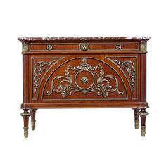 an ornate wooden cabinet with marble top