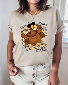 "Turkey Gravy Beans and Rolls Let Me See That Casserole Shirt, Turkey Lover Shirt, Family Thanksgiving Shirt, Thanksgiving Dinner Shirt, Fall PLEASE READ ORDERING INSTRUCTIONS BEFORE PURCHASINİNG \"CUSTOMIZATION\" If you are looking for a specific shirt style, design or color not offered in my store, please let me know. \"RETURNS / EXCHANGES\" Unfortunately, due to the customization of the shirts we are unable to accept returns or exchanges on merchandise. In case of dispute, the buyer pays the Turkey Shirts Women, Turkey Lover, Cute Thanksgiving Outfits, Turkey Shirts, Turkey Gravy, Thanksgiving Outfits, Family Thanksgiving, Thanksgiving Shirt, Shirt Printing