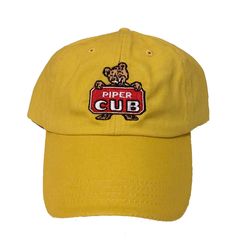 PRICES MAY VARY. 100% Cotton Hand Wash Only Vintage Piper Cub Logo Hat Brushed cotton twill cap with embroidered logo. Adjustable strap. Looks great to wear anywhere. Retro Cotton Dad Hat With Curved Bill, Vintage Cotton Trucker Hat With Logo Patch, Retro Cotton Dad Hat With Embroidered Logo, Spring Cotton Hat With Logo Patch, Retro Cotton Trucker Hat One Size, Retro Cotton Trucker Hat One Size Fits Most, Yellow Cotton Trucker Hat, Retro Cotton Trucker Hat With Curved Brim, Retro Cotton Baseball Cap With Curved Brim