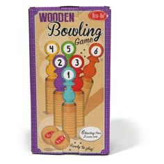 the wooden bowling game is in its cardboard box with numbers and balls on it's sides