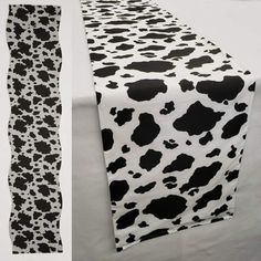 a cow print table runner with black and white spots on it, next to an image of a cow print table runner