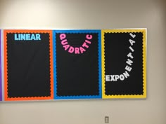 three bulletin boards are hanging on the wall