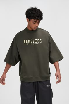 The Over-Oversized T-Shirt seamlessly blends vintage aesthetics with superior craftsmanship. This standout piece features a full raglan design and sleeves that extend past the elbows, providing a unique and relaxed silhouette. The prominent logo print on the chest adds an urban touch, making it perfect for streetwear enthusiasts. Made from premium 100% cotton fabric, this oversized tee ensures maximum comfort and durability. Vintage aesthetics Full raglan design Elbow-length sleeves Chest logo p Cheap Athletic Fit T-shirt With Logo Print, Elbow Length Tee Shirts, T Shirt Models Men, Over Size T Shirt Outfit Men, Logo Tee Shirt Design, Tshirt Photoshoot, Long Sleeve Shirts Men, Shirt Photoshoot, Logo P