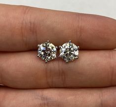 4.00 Carat TCW (Total Carat Weight) Lab Grown Round Diamond Stud Earrings, VS2, F or G, set on 14k Gold Settings, with Screw Backs, using Martini Style (six prongs).  When comparing to others, please note that we are using high quality VS2, F or G diamonds, and our settings are also high quality, stylish (martini style), and secure (screw backs with six prongs). Gia Certified 14k Gold Formal Earrings, Formal 14k Gold Gia Certified Earrings, Formal 14k Gold Earrings Gia Certified, Gia Certified 14k Gold Earrings For Formal Occasions, Gia Certified 14k Gold Diamond Earrings Gift, Classic 14k Diamond Earrings For Anniversary, 14k Stamped White Gold Diamond Earrings For Anniversary, White Gold Diamond Earrings Stamped 14k For Anniversary, Classic 14k Diamond Earrings