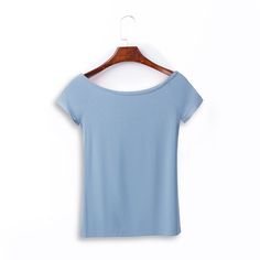 Modal Solid Color Slimming Basic Tee Material: Modal  (comfortable,smooth,good draping) Style: Slim fit Size: S, M, L, XL, XXL Color:Red, Navy Blue, White, Light Gray, Light Blue, Black, Wine Red  Occasion: Outdoor, Daily,  Vacation  Model: Height: 70.1 in (178 cm), Bust: 31.9 in (81 cm), Hips: 34.6 in (88 cm) Wash care instructions Avoid high temperature washing and drying, gentle washing, clean and lay flat 1. It is recommended to wash gently during the washing process and not to mix dark and light colors to avoid staining; 2. In order to maintain the shape and color of the clothes, please add salt water or white vinegar in the first wash. 3. When storing, avoid contacting the desiccant and cosmetics with the fabric. 4. Do not twist with excessive force when draining to reduce the deform Basic Solid Color Stretch Tops, Basic Stretch Tops In Solid Color, Basic Stretch Solid Color Tops, Summer T-shirt With Scoop Neck In Solid Color, Plain Non-stretch Summer Tops, Fitted Summer T-shirt In Solid Color, Versatile Fitted T-shirt, Casual Stretch Tops In Specific Color, Fitted Plain T-shirt For Summer