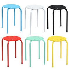 four different colored stools sitting side by side in the same color and shape, each with