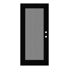 a black door with two white dots on it