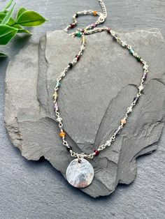 This delicate boho beaded gemstone necklace is made up of a wide variety of stones, including labradorite, aquamarine, citrine, moonstone, ruby, green onyx, sapphire, green opal, amethyst, quartz, prehnite, garnet, and many more!  Each stone is wire-wrapped by hand in 925 sterling silver to create a 16" necklace with a 1.5" extender chain. The silver coin pendant is removable.  NECKLACE FEATURES - Total Length - 16" + 1.5" Extender Chain - .925 Sterling Silver Wire, Chain and Clasp - Small 2mm Faceted Gemstones - Silver Coin Pendant (15mm) ♥  Sterling silver is hypoallergenic and safe to wear for those with sensitive skin. ♥  All orders come beautifully hand-packaged with care, making it the perfect gift for yourself or someone special.  ♥  Each piece is handmade with love in my home studi Gemstone Choker Necklace, Gemstone Choker, Gemstone Beads Jewelry, Gemstone Beaded Necklace, Necklace Layering, Green Opal, Amethyst Quartz, Silver Coin, Necklace Gemstone