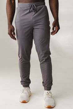 Our Navigator Jogger is designed to perform outdoors and on the go. This versatile jogger is a relaxed fit which offers functionality and comfort while also providing a sporty look to add to your wardrobe. Gray Moisture-wicking Activewear With 4-way Stretch, Gray 4-way Stretch Moisture-wicking Activewear, Casual Breathable Activewear With 4-way Stretch, Gray Sporty Activewear With 4-way Stretch, Sporty Gray Activewear With 4-way Stretch, Sporty Gray 4-way Stretch Activewear, Gray 4-way Stretch Sporty Activewear, Sporty Jogging Pants With Functional Drawstring, Functional Sports Pants With Elastic Waistband