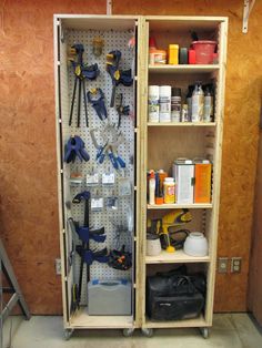 a cabinet with tools and supplies in it