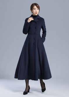 "\" It is strikingly elegant, and it carries itself with a brilliance of beauty and grandeur. It has a great classic silhouette.\" Details: * More color optional https://etsy.me/3AwTfvZ * Wool composition \" 50% wool blend + fiber + nylon\" ; Thick weight and warm wool * Absolutely fantastic coat! Very well-made and fully lined (matching satiny material). * It is classic and the color is so vibrant, color is shown in the picture-navy blue * double breasted fastening * two pockets * long sleeves Elegant A-line Outerwear With Buttons, Elegant Long Sleeve Wool Coat With Buttons, Elegant Single-breasted A-line Outerwear, Elegant A-line Wool Coat, Elegant Long Sleeve Peacoat For Office, Elegant Office Peacoat With Long Sleeves, Elegant Office Peacoat, Elegant Wool Coat With Buttons, Elegant Wool Peacoat With Buttons