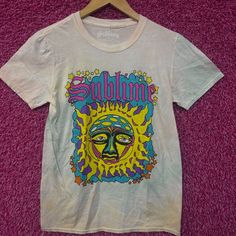 Sublime 40 Oz To Freedom Celestial Rock Tie Dye Womens Top M Generally Measures 17 Inches Pit To Pit And 28 Inches Long Never Worn First Hand Overstock Great Condition With An Amazing One Of A Kind Graphic For Fans Of The Legendary Ska Rock Band Sublime. This Tee Has Markings From The Manufacturing Process That Could Possibly Wash Off Pink Short Sleeve Tops For Music Festival, Hippie Streetwear Tops For Summer, Pink Summer Concert Top, Pink Summer Top For Concert, Pink Top For Summer Concerts, Pink Summer Concert T-shirt, Green Summer Concert Top, Green Summer Concert Tops, Green Summer Top For Concerts