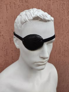 Genuine Crocodile Leather Eye Patch, Sport Eye Patch, Black Eye Patch, Eye Patch, Man Eye Patch, Woman Eye Patch, Slim Eye Patch, Eyepatch Will work for permanent use not touching the eye. This patch is not reversible, you will need to choose for the right or left eye. The eye patch is molded and don't irritate or touch the eyelid and eyelashes. The elastic band is ADJUSTABLE, so you can adjust it to the desired length according to the size of your head. Classic Regular size 5.5*7 cm (2*3 inch ) Eye Patch Character, Gold Eye Patch, Leather Eye Patch, Pirate With Eye Patch, Garden Belt, Pirate Eye Patch, Florist Tools, Eye Eye, Left Eye