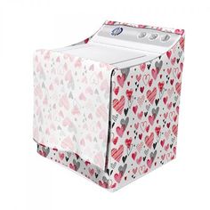 a white and pink box with hearts printed on it's sides, sitting in front of a white background