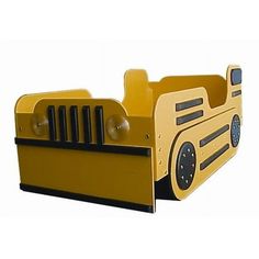 a yellow toy truck bed with black trim