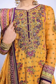 Pakistani Bridal Mehndi Dress in Gharara Kameez Style is a breathtaking attire emblazoned with Zardosi and Floral designs. Custom sizes. Fast shipping. Pakistani Bridal Mehndi, Kameez Style, Pakistani Mehndi Dress, Bridal Mehndi Dresses, Pakistani Mehndi, Mehndi Dress, Zardosi Work, Zardozi Work, Eid Dresses