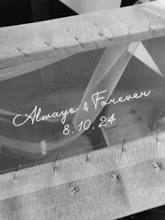 a close up of a wedding sign on a chair with the words always & forever written on it