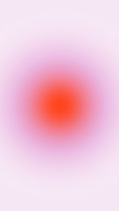 an orange and pink circle is shown in the middle of a white background with red center