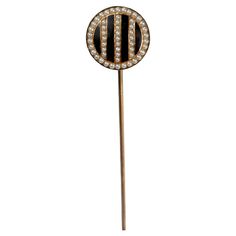 A very fine signed Art Deco hat pin. By Riker Bros. In 14k yellow gold. With alternating stripes of black enamel and channel set seed pearls. The reverse is hinged to very long pin stem. Simply a wonderfully handsome Art Deco hat pin! Date: Early 20th Century Overall Condition: It is in overall good, as-pictured, used estate condition with some fine & light surface scratches and other signs of expected light wear consistent with age. Fineness: Marked 14k for gold fineness. Marks: 14k and Riker B Sombrero Art, Brothers Sign, Art Deco Hats, Pin Art, Hat Pin, Seed Pearl, Gold Enamel, Hat Pins, Black Enamel