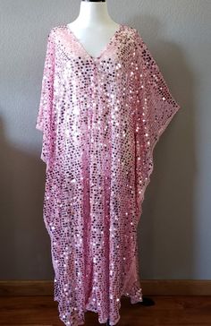 Made to order...Pink Sequin Caftan DressLarge iridescent round sequinPink Sheer lightweight fabricOversized kimono style sleevesOne Size Fits MeasurementsWidth: 46" (armpit to arm pit)Total Length : 50-56" CareHand Wash Cold Please allow me 2-3 business days to make the item prior to shipping.