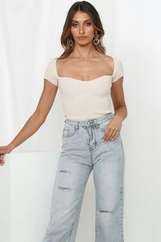 Length from shoulder to hem of size S/M: 54cm. Beige knit top. Non-lined. Cold hand wash only.  Model is a standard XS and is wearing size XS.  True to size.  Lightweight, stretchy knit fabric. No zipper. Slip-on style.  Rayon/Spandex. Oh dear. Back to back day? No sweat babe! Chic and all-day sophistication is easy with this lush new edit! Show off all your assets with the knit top's fitted silhouette and romantic Queen Anne neckline. We're teaming ours with our fave denim jeans and mid-low mules. Queen Anne Neckline, Oh Dear, Back Day, Knit Blazer, Neutral Outfit, Long Sleeve Lace Dress, Fitted Silhouette, New Tops, Classy Women