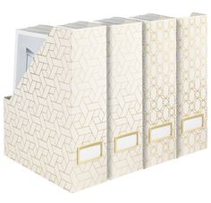 three white binders with gold trimmings on each side and an open file folder in the middle