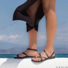 Open Toe Flat Casual Sandals Single Toe Strap Sandals For Summer Beach, Summer Beach Sandals With Single Toe Strap, Summer Vacation Toe Loop Flip Flops, Toe Post Slingback Sandals For Beach Vacation, T-strap Sandals With Single Toe Strap For Beach Vacation, Beach T-strap Sandals With Single Toe Strap, Summer Beach Slingback Sandals With Single Toe Strap, Black Toe Ring Sandals For Spring Vacation, Summer Toe Post T-strap Sandals For Beach