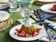 a plate with some strawberries on top of it