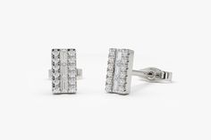 "Diamond Stud Earrings / 14K Gold Baguette Diamond Stud Earrings / Mini Baguette Diamond Studs Sold as a Pair / Dainty Diamond Earrings by Ferkos Fine JEwelry Features ✔Made to Order ✔Gold Kt: 14K (also available in 18K) ✔Available Gold Color: Rose Gold, Yellow Gold, White Gold ✔Length and Width: 6.75 X 3.75MM ✔Baguette Diamonds: 6 pcs 2.25 x 1.25 ✔ Round Diamonds: 24 pcs 1.00MM ✔Number of Diamonds: 30 ✔Total CTW: 0.30ctw ✔ Diamond Color-Clarity: G Color VS Clarity If you have any additional que Classic Evening Baguette Diamond Earrings, Baguette Diamond Earrings Fine Jewelry, Formal Baguette Cut Diamond Earrings, Sterling Silver Baguette Diamond Earrings For Formal Occasions, Diamond Baguette Earrings For Formal Occasions, Luxury Rectangular Diamond Earrings, Baguette Diamond Earrings For Formal Occasions, Formal Sterling Silver Earrings With Baguette Diamonds, Formal Sterling Silver Baguette Diamond Earrings