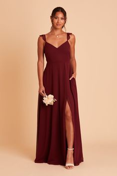 Fall for this airy chiffon bridesmaid dress in Cabernet complete with a bow in the back and flutter cap sleeves. Float down the aisle in this airy bridesmaid dress with flutter-y chiffon sleeves, all wrapped up with a delicate bow in the back. | Cabernet Bridesmaid Dress Chiffon Size 1X | Birdy Grey Doris Cabernet Bridesmaid Dresses, Scoop Neck Bridesmaid Dress, Bridal Party Colors, Flattering Bridesmaid Dresses, Bridesmaid Dress Chiffon, Bridesmaid Dresses Under 100, Party Colors, Birdy Grey, Burgundy Bridesmaid