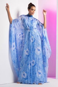 Blue asymmetric kaftan featuring floral prints and pleated detailing, Fit: Relaxed Khaleeji Outfits, Festive Floor-length Kaftan With Draped Sleeves, Festive Blue Floor-length Kaftan, Blue Floral Embroidered Festive Kaftan, Luxury Printed Blue Kaftan, Elegant Blue Floral Print Kaftan, Kaftan Sleeves, Chiffon Kaftan, Kaftan For Women