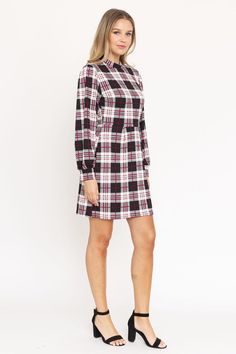 High Neck Plaid Sheath DressLooking for a versatile and stylish dress that can take you from the office to a date night? Look no further than our High Neck Plaid Sheath Dress! This flattering dress is made from a polyester-spandex blend, so it's both comfortable and figure-hugging. The high neckline and plaid print give it a touch of sophistication, while the shorter hemline keeps it fun and flirty. Pair it with heels and a blazer for a polished work look, or dress it down with flats and a denim