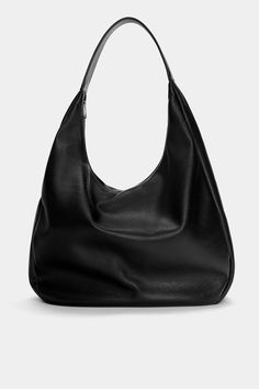 Urban-style shopper bag, available in black. Long shoulder strap. Zipper closure.Height x Length x Width: 51.5 x 44 x 2.5 cm. Shopper Bags, Black Shoulder Bag For Shopping, Shoppers Bag, School Bag Inspiration, Black School Handbag, Medium Shoulder Bag, Slouchy Tote Bag, Bag School Aesthetic, School Bag Y2k