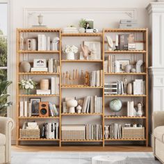 a living room filled with lots of furniture and bookshelves on top of wooden shelves