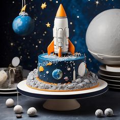 a cake that is shaped like a rocket ship