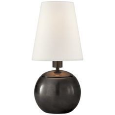 a table lamp with a white shade on it's base and a black ball