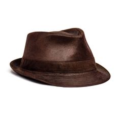 Please note: This hat runs large, recommend one size down.Embrace class and sophistication. Our Faux Leather Trilby Fedora features a smooth, realistic faux leather material that's both soft and durable. If you're looking for a hat that can be paired with casual and formal outfits alike, you'll love this lightweight leather fedora. Moreover, our Faux Leather Trilby Hat includes a comfortable inner hat band and satin lining. Wherever you take this fedora, you're sure to turn heads. Stylish and functional, our Saint Martin faux leather trilby hat is a versatile accessory that pairs well with a wide range of wardrobe ensembles. We offer beautiful black and brown color options in this faux leather fedora style. What Makes This Classic Style Stand Out? The Saint Martin Faux Leather Trilby Fedor Elegant Leather Fedora For Fall, Classic Leather Fedora With Flat Brim, Brown Leather Fedora For Fall, Leather Fedora For Fall, Brown Leather Fedora For Winter, Classic Leather Top Hat With Wide Brim, Winter Leather Short Brim Felt Hat, Brown Leather Wide Brim Top Hat, Classic Leather Felt Hat With Short Brim