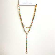 Never Worn! Adjustable Multicolor Beaded Necklace With Chain, Multicolor Lariat Necklaces For Party, Multicolor Lariat Necklace For Party, Multicolor Necklaces With Adjustable Chain For Summer, Trendy Colorful Beaded Chain Necklace As Gift, Multicolor Necklace With Adjustable Chain For Summer, Trendy Beaded Layered Necklace For Gifts, Trendy Colorful Beads Chain Necklace Gift, Multicolor Beaded Chain Layered Necklace For Gift