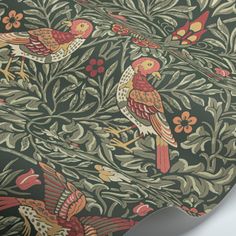 a wallpaper with birds and flowers on it's back side, as well as the background