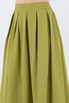 Vintage vibes with our box pleats midi skirts. Wear yours with a graphic t-shirt and sneakers, or dress it up with a fitted top and heels. Make it your own style for any occasion. Fit is true to size. Waistband has back elastic for stretch. Fabric: 100% polyester. Box Pleat Skirt, Pleat Skirt, Green Box, Fitted Top, Midi Skirts, Box Pleats, Pleated Midi Skirt, Vintage Vibes, Own Style