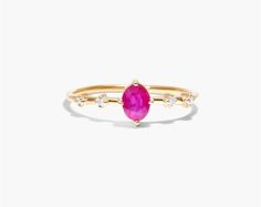 14K Yellow Gold Oval Ruby and Diamond Birthstone Ring. This ring pairs vintage style with royal elegance. Wear this classic ring and add luxury everyday and on special occassions. Elegant Oval Ruby Ring With Rose Cut Diamonds, Elegant Oval Cabochon Ruby Ring For Wedding, Elegant Ruby Ring With Oval Diamond, Elegant Ruby Ring With Gemstone Accents, Elegant Diamond Oval Cabochon Ring, Elegant Oval Cabochon Diamond Ring, Elegant Ruby Ring With Gemstone Accents For Anniversary, Classic Diamond Ring With Gemstone Accents, Classic Diamond Ring With Gemstone Accents For Wedding